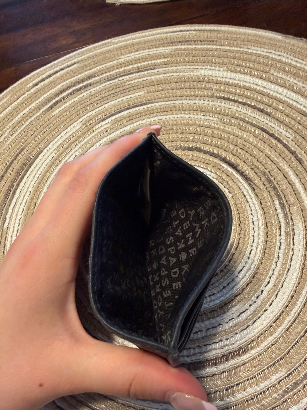 Black Kate Spade card holder. - Picture 3 of 3